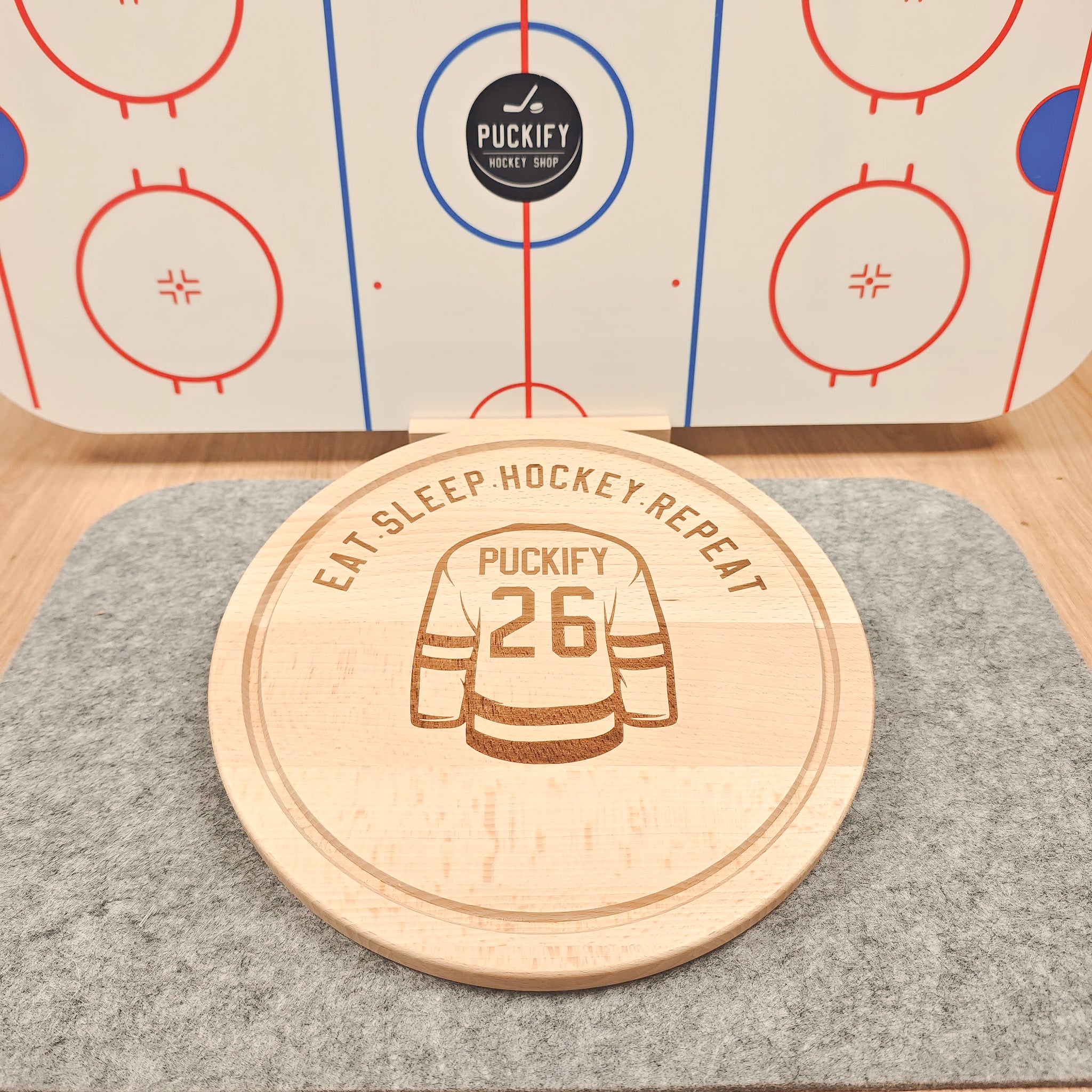 Board round -Eat. Sleep. Hockey. Repeat.-