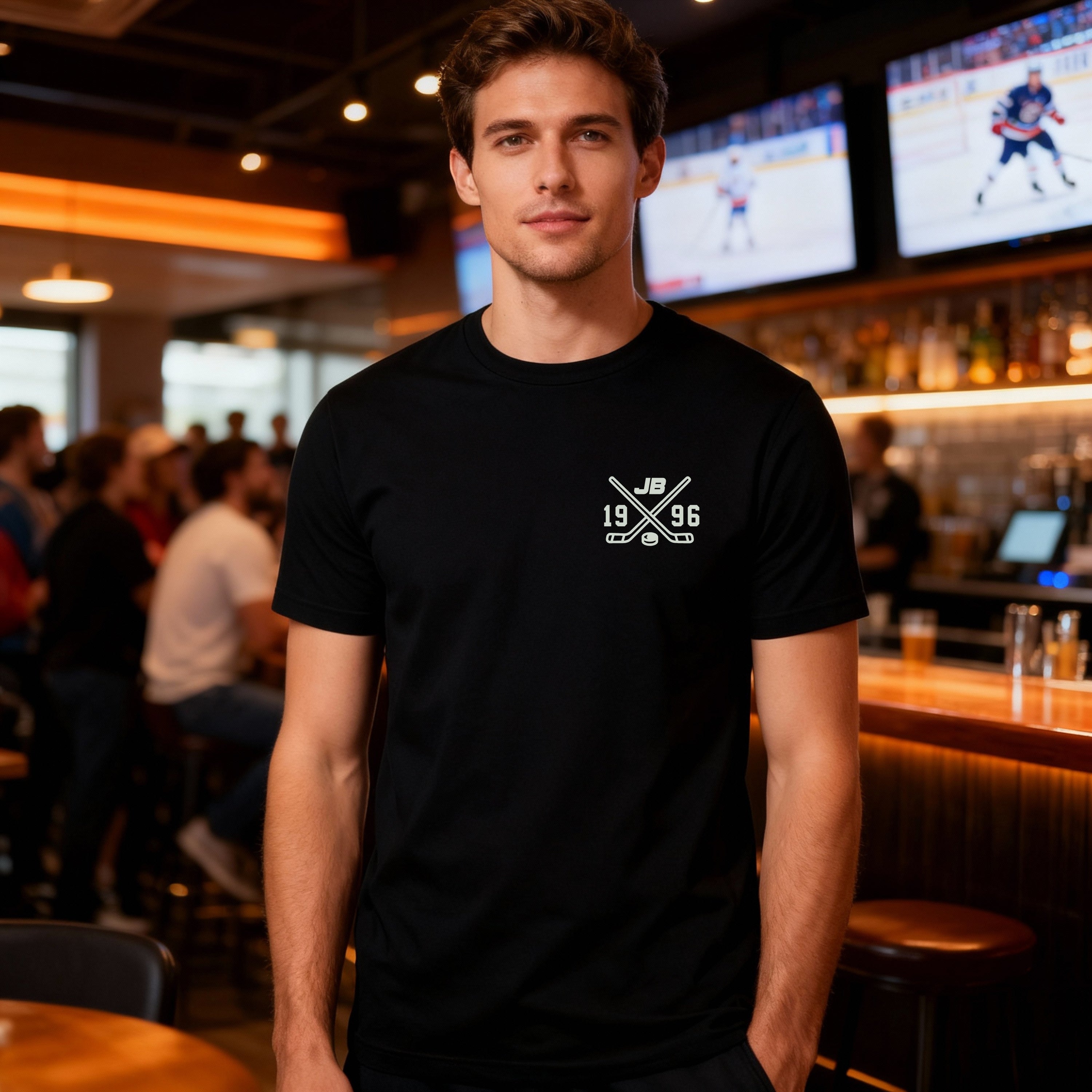 Black T-shirt, ice hockey stick cross